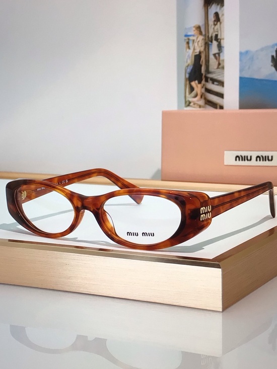 Miu Miu Accessories - Miu Miu Brown Tortoiseshell Cat-Eye Sunglasses